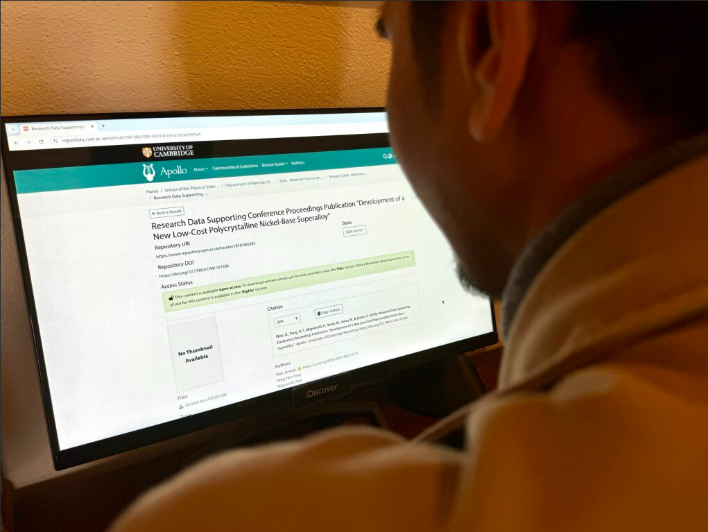 Photo of a researcher searching Apollo, the University of Cambridge repository, on a computer.